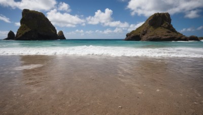 outdoors,sky,day,cloud,water,blue sky,no humans,ocean,beach,cloudy sky,scenery,rock,sand,horizon,waves,shore