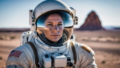 solo,looking at viewer,blue eyes,black hair,1boy,upper body,male focus,outdoors,blurry,depth of field,blurry background,helmet,science fiction,mountain,realistic,american flag,spacesuit,desert,space helmet,astronaut,brown eyes,closed mouth,sky,day,lips,backpack,portrait,reflection,dirty,united states,american flag print