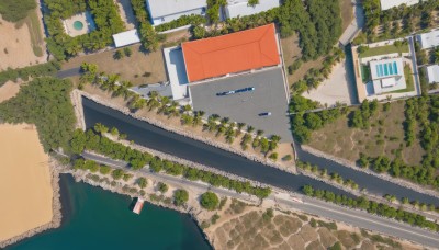 outdoors,day,water,tree,no humans,window,grass,plant,building,scenery,sign,road,street,road sign,from above,ground vehicle,motor vehicle,stairs,car,train,moss,railroad tracks,truck,overgrown