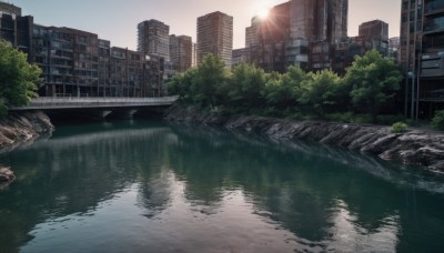 outdoors,sky,day,cloud,water,tree,no humans,sunlight,building,scenery,reflection,sunset,city,sun,road,bush,cityscape,bridge,river,skyscraper,reflective water,real world location,blue sky,window,lens flare,lamppost