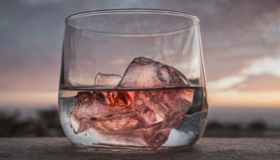 red eyes,outdoors,sky,cloud,water,blurry,cup,no humans,depth of field,blurry background,cloudy sky,scenery,drinking glass,reflection,ice,realistic,drink,glass,food focus,still life,ice cube,food,fish,sunset,meat