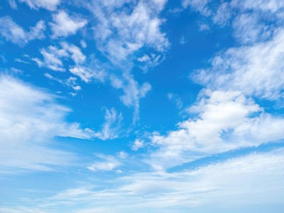 monochrome,outdoors,sky,day,cloud,water,blue sky,no humans,ocean,cloudy sky,scenery,reflection,blue theme,horizon,above clouds