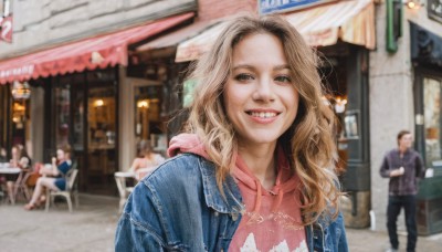 1girl,long hair,looking at viewer,smile,open mouth,multiple girls,blonde hair,brown hair,shirt,brown eyes,sitting,standing,jacket,upper body,outdoors,multiple boys,open clothes,teeth,solo focus,day,pants,hood,grin,blurry,lips,hoodie,depth of field,blurry background,chair,table,hood down,denim,forehead,jeans,realistic,restaurant,denim jacket,street,photo background,real world location