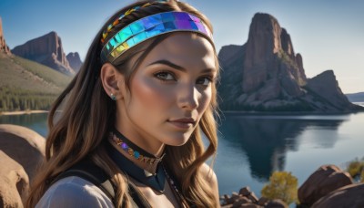 1girl,solo,long hair,looking at viewer,smile,brown hair,brown eyes,jewelry,closed mouth,upper body,hairband,earrings,outdoors,sky,choker,day,water,necklace,blue sky,lips,headband,portrait,reflection,rock,mountain,realistic,nose,river,lake,black hair,dark skin,dark-skinned female,tree,sunlight,thick eyebrows,scenery