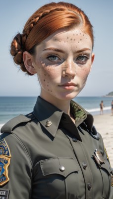 1girl,solo,breasts,looking at viewer,short hair,brown hair,shirt,brown eyes,closed mouth,jacket,upper body,braid,outdoors,sky,solo focus,day,collared shirt,hair bun,blurry,uniform,blue sky,lips,grey eyes,military,military uniform,buttons,blurry background,ocean,beach,single hair bun,freckles,epaulettes,realistic,grey jacket,sand,badge,braided bun,patch,green eyes,water,pocket,breast pocket,dirty,military jacket,world war ii,soldier,dirty face,insignia