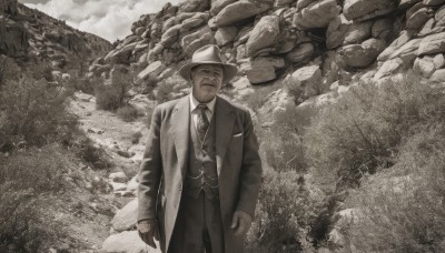 solo,smile,short hair,shirt,long sleeves,1boy,hat,closed mouth,standing,jacket,monochrome,closed eyes,greyscale,male focus,outdoors,open clothes,necktie,collared shirt,pants,cloud,vest,coat,facial hair,formal,suit,facing viewer,rock,mustache,arms at sides,old,old man,fedora,looking at viewer,cowboy shot,black pants,open coat,sepia,cowboy hat,brown theme