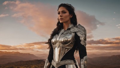 1girl,solo,long hair,brown hair,black hair,brown eyes,jewelry,closed mouth,upper body,earrings,outdoors,sky,cloud,dark skin,armor,dark-skinned female,lips,looking to the side,wavy hair,cloudy sky,shoulder armor,curly hair,pauldrons,breastplate,mountain,realistic,looking afar,chainmail,looking at viewer,sunset