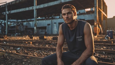 solo,looking at viewer,short hair,brown hair,shirt,black hair,1boy,sitting,male focus,outdoors,sleeveless,belt,pants,blurry,black shirt,sleeveless shirt,blurry background,facial hair,headphones,tank top,building,beard,realistic,photo background,brown eyes,closed mouth,indoors,scar,black pants,denim,meme,stubble,black tank top