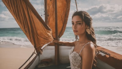 1girl,solo,long hair,looking at viewer,brown hair,black hair,dress,bare shoulders,brown eyes,jewelry,collarbone,upper body,braid,earrings,outdoors,parted lips,sky,sleeveless,day,cloud,dark skin,water,white dress,dark-skinned female,lips,ocean,beach,cloudy sky,forehead,realistic,sand,horizon,spaghetti strap,watercraft,ship,waves,boat,breasts,sundress