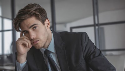 solo,looking at viewer,short hair,blue eyes,brown hair,shirt,long sleeves,1boy,closed mouth,jacket,white shirt,upper body,male focus,necktie,collared shirt,indoors,hand up,blurry,black jacket,window,blurry background,facial hair,formal,suit,black necktie,hand on own face,realistic,stubble,black suit,depth of field,expressionless,head rest