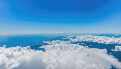 monochrome,outdoors,sky,day,cloud,blue sky,no humans,ocean,cloudy sky,scenery,blue theme,horizon,landscape,above clouds,water