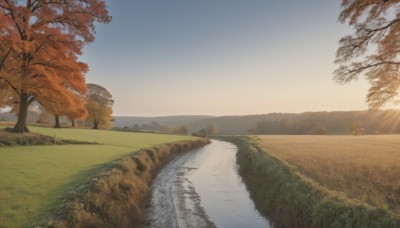 outdoors,sky,day,water,tree,blue sky,no humans,sunlight,grass,nature,scenery,sunset,rock,mountain,sun,autumn leaves,river,autumn,landscape,desert,cloud,road