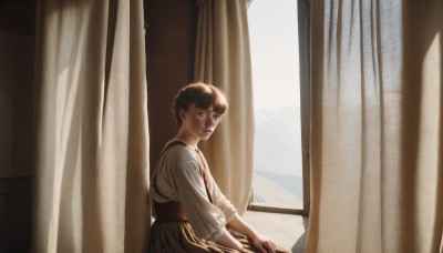 1girl,solo,looking at viewer,short hair,skirt,brown hair,shirt,long sleeves,dress,brown eyes,sitting,white shirt,day,indoors,from side,lips,window,sunlight,suspenders,curtains,freckles,realistic,nose