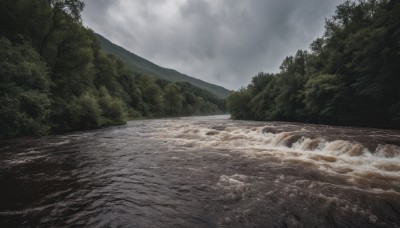 outdoors,sky,day,cloud,water,tree,no humans,ocean,beach,cloudy sky,nature,scenery,forest,mountain,river,waves,landscape,shore,grey sky,rock,overcast