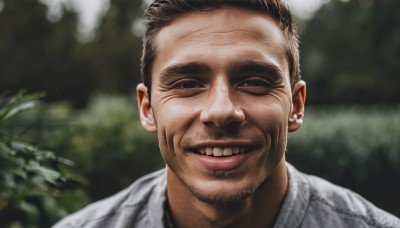 solo,looking at viewer,smile,short hair,brown hair,shirt,black hair,1boy,brown eyes,white shirt,male focus,outdoors,parted lips,teeth,grin,blurry,black eyes,blurry background,facial hair,thick eyebrows,portrait,beard,realistic,stubble,open mouth,lips,depth of field,meme,very short hair