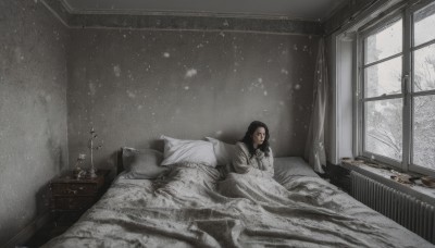 1girl,solo,long hair,black hair,long sleeves,dress,monochrome,flower,lying,indoors,white dress,tree,pillow,window,bed,on bed,on stomach,curtains,snow,snowing,blanket,winter,bare tree,vase,drawer,looking at viewer,realistic,lamp,grey theme