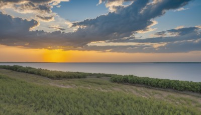 outdoors,sky,day,cloud,water,tree,blue sky,no humans,ocean,sunlight,cloudy sky,grass,nature,scenery,sunset,sun,horizon,field,evening,landscape,gradient sky,orange sky,hill,beach