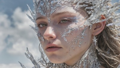 1girl,solo,long hair,looking at viewer,blonde hair,brown hair,brown eyes,jewelry,green eyes,earrings,outdoors,parted lips,sky,day,cloud,blurry,blue sky,lips,grey eyes,blurry background,cloudy sky,portrait,snow,freckles,ice,crystal,realistic,eyelashes,close-up