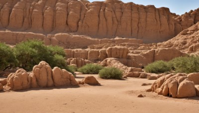 outdoors,sky,day,tree,blue sky,no humans,grass,nature,scenery,rock,sand,road,bush,desert,stone,cliff