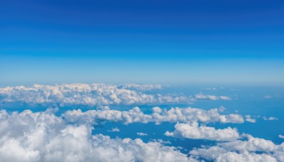 monochrome,outdoors,sky,day,cloud,blue sky,no humans,ocean,cloudy sky,scenery,blue theme,horizon,cityscape,landscape,above clouds,water