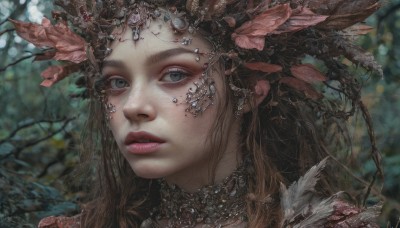 1girl,solo,long hair,looking at viewer,blue eyes,brown hair,hair ornament,jewelry,outdoors,parted lips,teeth,blurry,lips,grey eyes,eyelashes,makeup,depth of field,blurry background,leaf,feathers,portrait,freckles,realistic,red lips,feather hair ornament,tree,plant,nature,close-up,nose