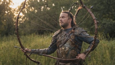 solo,short hair,brown hair,black hair,long sleeves,1boy,holding,closed mouth,standing,upper body,weapon,male focus,outdoors,day,holding weapon,armor,blurry,tree,blurry background,facial hair,grass,shoulder armor,nature,beard,forest,pauldrons,bow (weapon),breastplate,stubble,arrow (projectile),looking afar,holding bow (weapon),quiver,holding arrow,braid,parted lips,sunlight,looking up,realistic,branch,antlers,dappled sunlight,chainmail