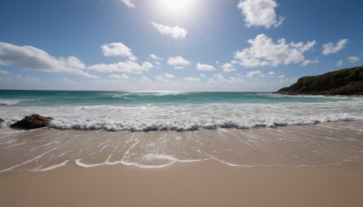 outdoors,sky,day,cloud,water,blue sky,no humans,ocean,beach,sunlight,cloudy sky,scenery,rock,sand,sun,horizon,waves,shore,light rays