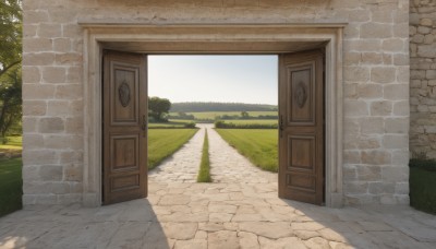 outdoors,sky,day,tree,no humans,window,shadow,grass,plant,building,nature,scenery,door,road,bush,wall,house,path,cloud,blue sky,shade,brick wall