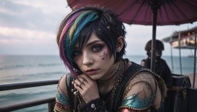 1girl,looking at viewer,short hair,bangs,black hair,hair ornament,1boy,bare shoulders,jewelry,closed mouth,green eyes,blue hair,upper body,pink hair,purple hair,multicolored hair,earrings,outdoors,sleeveless,solo focus,day,artist name,hand up,water,necklace,mole,blurry,bracelet,two-tone hair,lips,streaked hair,eyelashes,tattoo,makeup,depth of field,blurry background,ocean,umbrella,watermark,piercing,ring,lipstick,ear piercing,web address,eyeshadow,freckles,realistic,nose,red lips,eyeliner,watercraft,ship,mascara,multiple rings,multiple girls,brown hair,2girls,sky,choker,facial mark,feathers,messy hair,oil-paper umbrella,facepaint