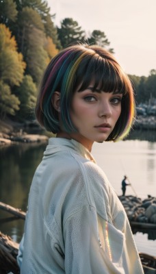 1girl,solo,looking at viewer,short hair,bangs,shirt,black hair,brown eyes,jewelry,white shirt,upper body,multicolored hair,earrings,outdoors,parted lips,day,signature,water,blurry,black eyes,from side,two-tone hair,tree,lips,streaked hair,blurry background,bob cut,freckles,realistic,nose,river,looking back,looking to the side,thick eyebrows