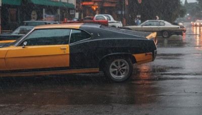 outdoors,no humans,night,ground vehicle,building,scenery,motor vehicle,rain,city,sign,car,road,vehicle focus,lamppost,street,wheel,sports car,realistic