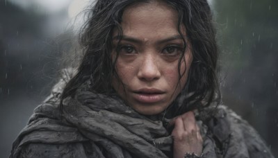 1girl,solo,long hair,looking at viewer,black hair,brown eyes,outdoors,parted lips,scarf,blurry,black eyes,lips,wet,depth of field,blurry background,messy hair,portrait,freckles,rain,realistic,nose,wet hair,grey scarf,close-up,forehead,dirty