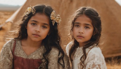 long hair,looking at viewer,multiple girls,brown hair,shirt,black hair,hair ornament,dress,2girls,brown eyes,closed mouth,white shirt,upper body,flower,outdoors,parted lips,day,hair flower,blurry,lips,depth of field,blurry background,siblings,wavy hair,red dress,sisters,child,curly hair,twins,realistic,female child,blush,bangs,hair bow,dark skin,dark-skinned female,looking up,veil,lace trim,lace