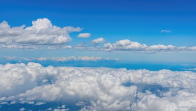 outdoors,sky,day,cloud,water,blue sky,no humans,ocean,cloudy sky,scenery,blue theme,horizon,landscape,above clouds,monochrome