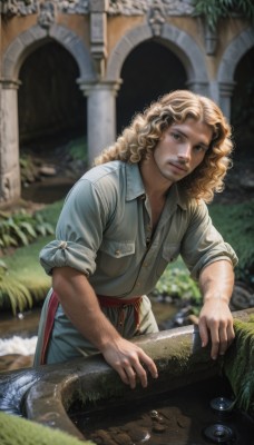 solo,long hair,looking at viewer,blonde hair,shirt,1boy,brown eyes,closed mouth,standing,short sleeves,male focus,outdoors,parted lips,day,collared shirt,pants,blurry,lips,leaning forward,depth of field,blurry background,facial hair,grass,blue shirt,grey shirt,beard,sleeves rolled up,curly hair,pocket,realistic,breast pocket,dirty,statue,water,necklace,leaf,watermark,wavy hair,rock,stubble,arm hair