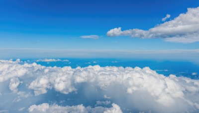 monochrome,outdoors,sky,day,cloud,water,blue sky,no humans,ocean,cloudy sky,scenery,blue theme,horizon,above clouds