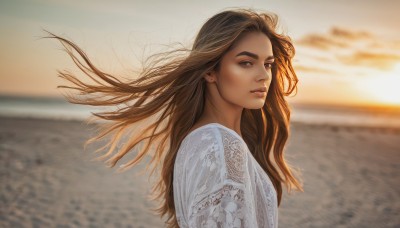 1girl,solo,long hair,looking at viewer,brown hair,shirt,brown eyes,closed mouth,white shirt,upper body,outdoors,sky,cloud,water,blurry,from side,lips,looking to the side,dutch angle,floating hair,depth of field,blurry background,ocean,beach,thick eyebrows,wind,sunset,realistic,nose,horizon,earrings,sunlight,freckles