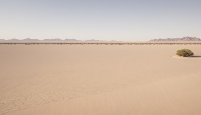 outdoors,sky,day,tree,blue sky,no humans,beach,nature,scenery,mountain,sand,horizon,road,field,landscape,mountainous horizon,shore,hill,desert,ground vehicle,motor vehicle,military vehicle,tank,vehicle focus