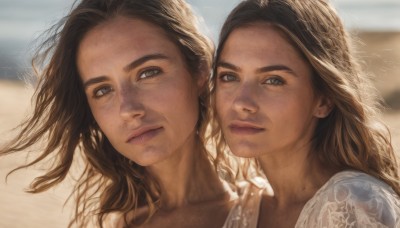 long hair,looking at viewer,blue eyes,multiple girls,brown hair,black hair,2girls,closed mouth,collarbone,upper body,outdoors,day,dark skin,mole,blurry,dark-skinned female,lips,grey eyes,blurry background,siblings,portrait,freckles,realistic,nose,brown eyes,jewelry,earrings,depth of field,wavy hair,expressionless,sunlight,thick eyebrows,wind,messy hair