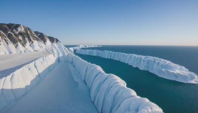 outdoors,sky,day,water,blue sky,no humans,shadow,ocean,beach,scenery,ice,rock,mountain,sand,horizon,landscape,shore,artist name,cloud,english text,snow,blue theme