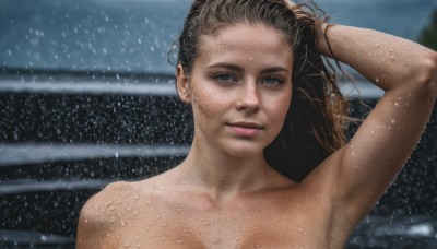 1girl,solo,long hair,breasts,looking at viewer,smile,blue eyes,brown hair,black hair,jewelry,closed mouth,collarbone,upper body,nude,earrings,outdoors,armpits,water,blurry,arm up,lips,wet,blurry background,freckles,rain,hand in own hair,realistic,nose,wet hair,grey eyes,wind,portrait