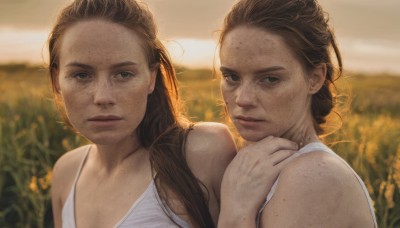 long hair,looking at viewer,multiple girls,brown hair,dress,2girls,bare shoulders,brown eyes,closed mouth,upper body,outdoors,sleeveless,white dress,mole,blurry,lips,mole under eye,blurry background,siblings,sisters,forehead,freckles,realistic,field,flower,day,depth of field,expressionless,sunlight,portrait,hair over shoulder,backlighting,sunset,dirty,flower field,mole on cheek