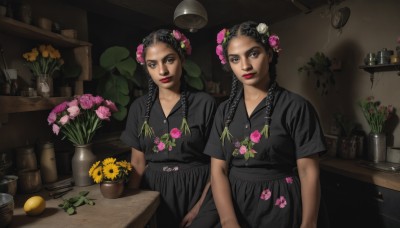 long hair,looking at viewer,smile,multiple girls,black hair,hair ornament,dress,2girls,brown eyes,braid,flower,short sleeves,belt,indoors,hair flower,black eyes,black dress,twin braids,makeup,fruit,floral print,table,bottle,plant,lipstick,pink flower,realistic,yellow flower,red lips,potted plant,shelf,vase,light bulb,skirt,shirt,food,signature,black skirt,lips,black shirt,shadow,leaf