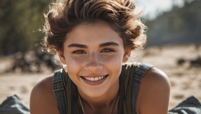 1girl,solo,looking at viewer,smile,short hair,open mouth,brown hair,bare shoulders,brown eyes,jewelry,upper body,earrings,outdoors,teeth,sleeveless,day,dark skin,bag,grin,blurry,dark-skinned female,lips,depth of field,blurry background,backpack,messy hair,portrait,freckles,curly hair,realistic,stud earrings,1boy,:d,male focus,thick eyebrows,backlighting,rock,overalls