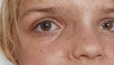 1girl,solo,looking at viewer,short hair,blonde hair,simple background,1boy,white background,brown eyes,closed mouth,male focus,lips,eyelashes,portrait,close-up,freckles,realistic,eye focus