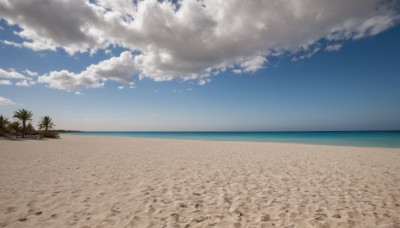 outdoors,sky,day,cloud,water,tree,blue sky,no humans,ocean,beach,cloudy sky,scenery,rock,sand,palm tree,horizon,shore,nature,island