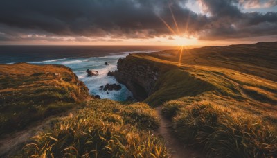 outdoors,sky,cloud,water,tree,no humans,ocean,sunlight,cloudy sky,grass,nature,scenery,sunset,mountain,sun,horizon,field,river,landscape,beach,light rays