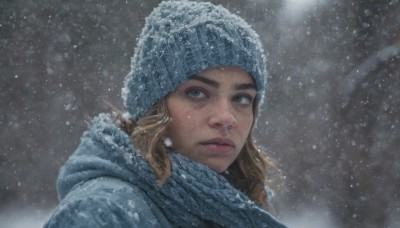 1girl,solo,long hair,looking at viewer,blonde hair,brown hair,hat,closed mouth,upper body,outdoors,hood,scarf,lips,coat,portrait,snow,snowing,realistic,nose,beanie,winter clothes,winter,fur hat,blue eyes,grey eyes,thick eyebrows,hood down,blue headwear,freckles,blue scarf,blue coat