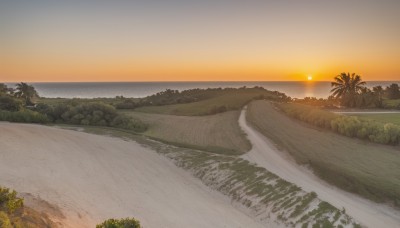 outdoors,sky,cloud,water,tree,no humans,ocean,beach,grass,plant,nature,scenery,sunset,sand,palm tree,sun,horizon,road,river,landscape,shore,orange sky,forest,bush