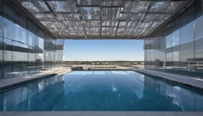 outdoors,sky,day,cloud,indoors,water,blue sky,no humans,window,sunlight,building,scenery,reflection,city,cityscape,bridge,skyscraper,train station,reflective floor,reflective water,blue theme